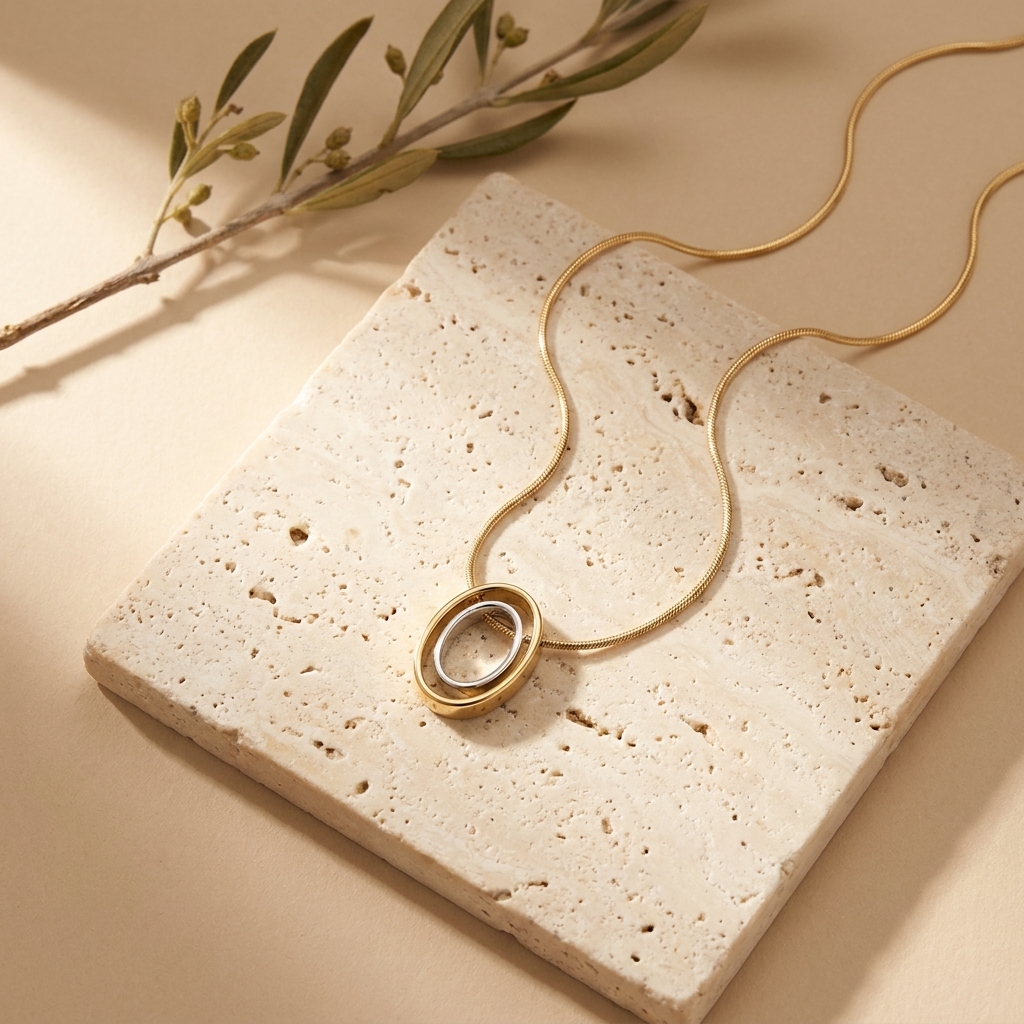 Collar Órbita — collares de acero bicolor con baño de oro 18k