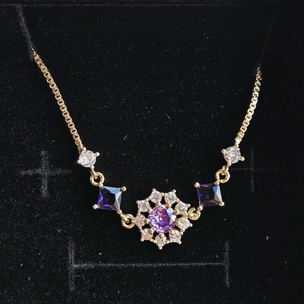 Pulsera Flor Morada con baño de oro 14k
