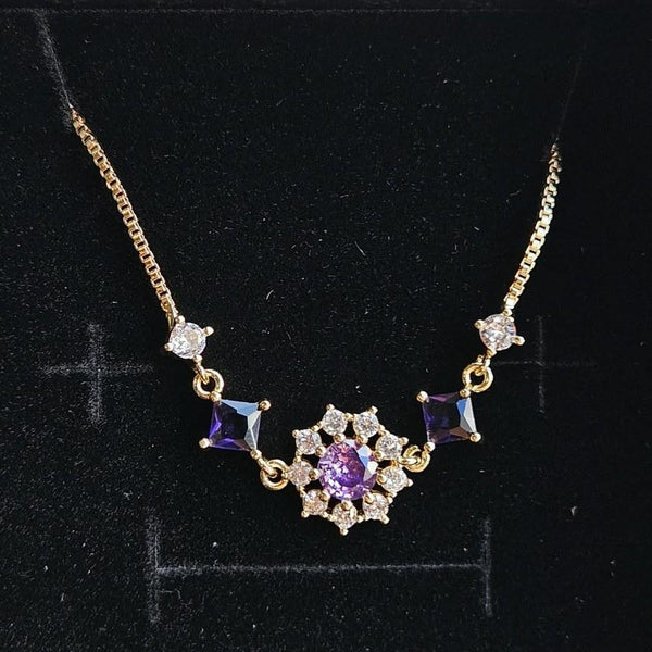 Pulsera Flor Morada con baño de oro 14k