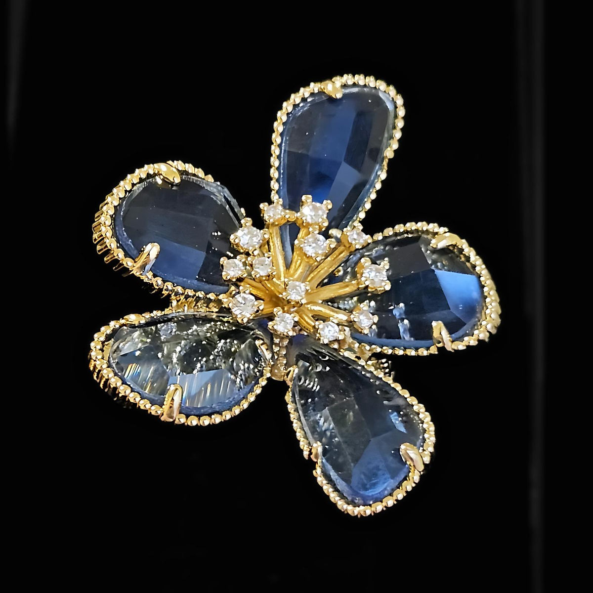 Anillo Flor de Medianoche (ajustable) - Acero con baño de oro 18k