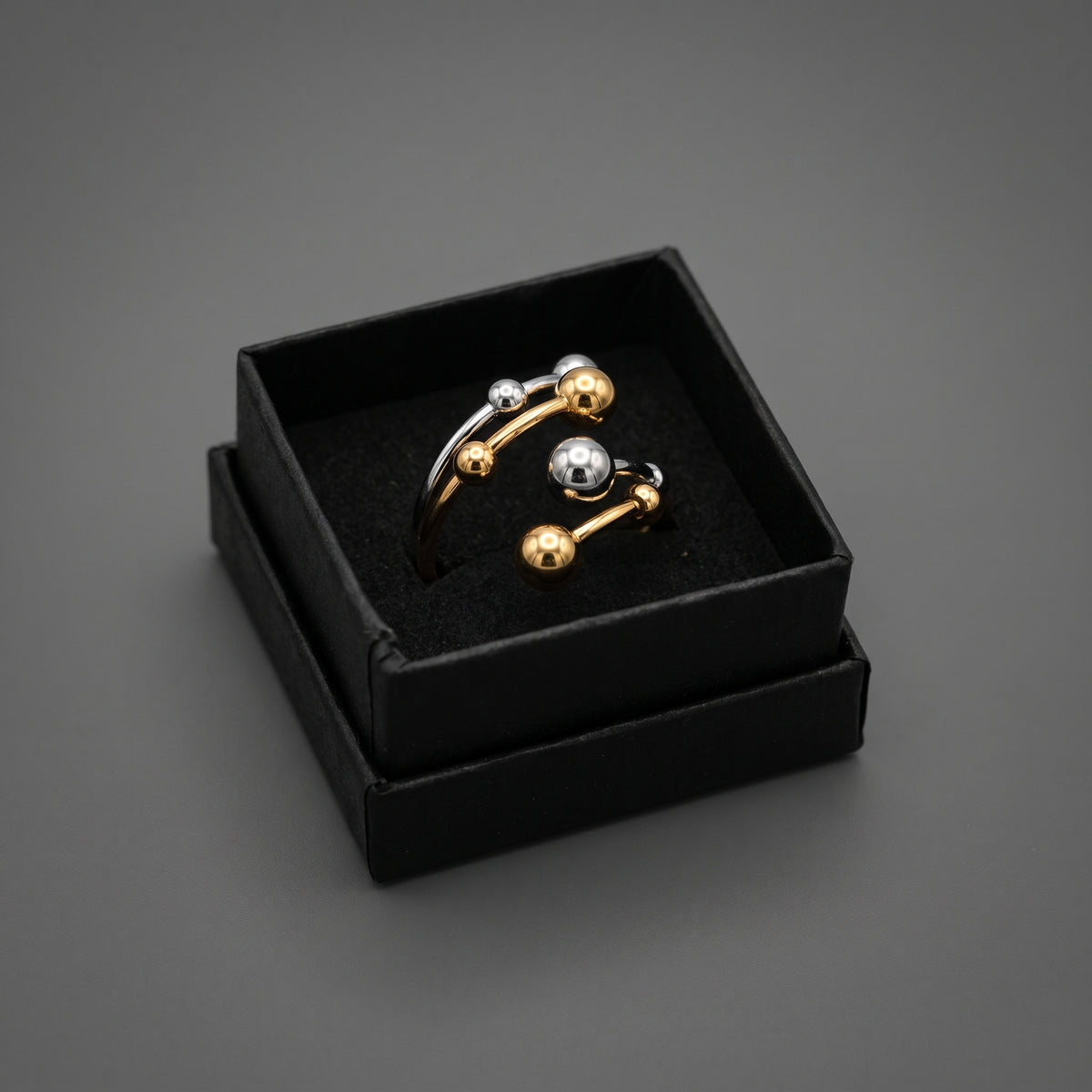 Anillo Atomium - Acero inoxidable plateado y baño de oro de 18k